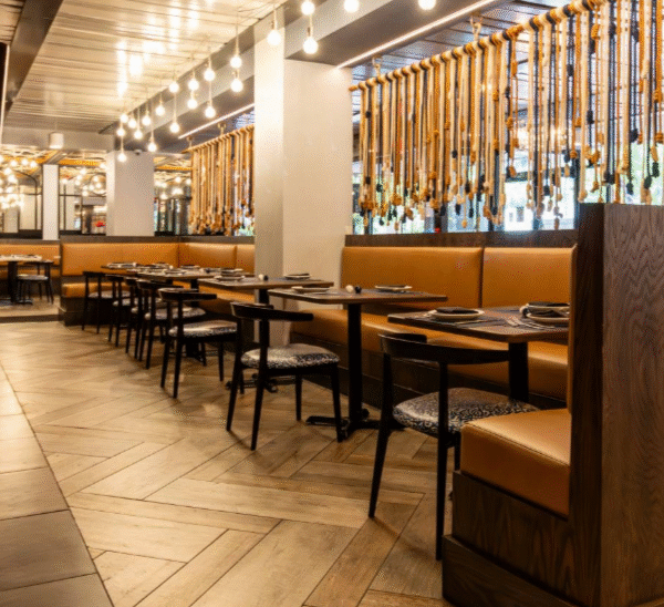 Mixed Materials Are Defining Custom Commercial Millwork in 2026: Why Wood, Laminate, Quartz, and Solid Surface Are Showing Up in the Same Project