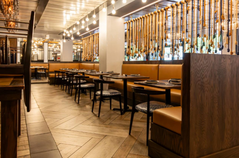 Mixed Materials Are Defining Custom Commercial Millwork in 2026: Why Wood, Laminate, Quartz, and Solid Surface Are Showing Up in the Same Project